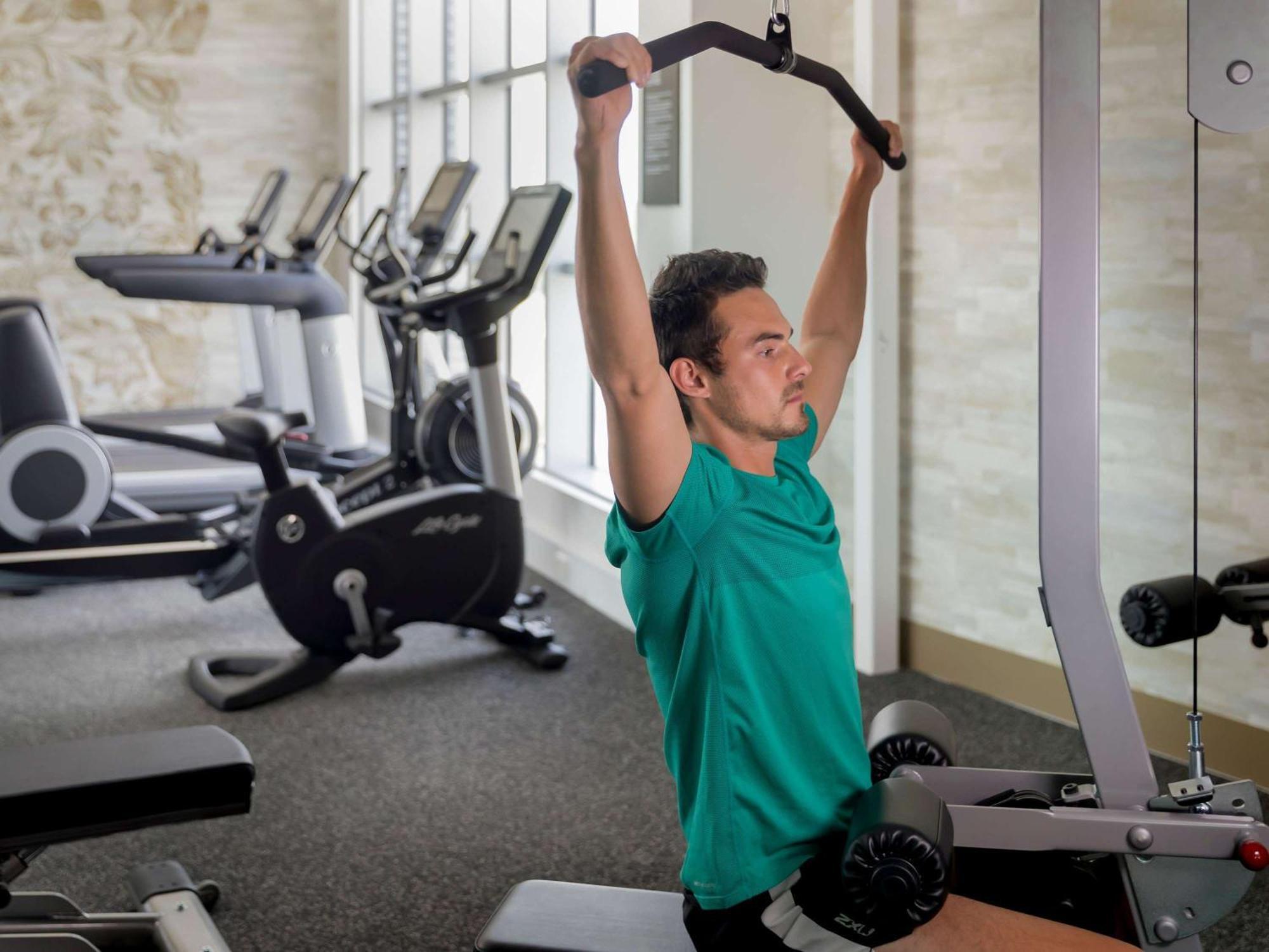 The William Inglis Mgallery Warwick Farm Extérieur photo A man performing a lat pulldown